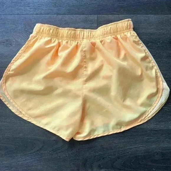 Nike Dri-Fit Shorts.  Women’s size medium. Very cute yellow color! - Picture 4 of 5